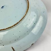 Delftware dish with blue flowers on a white background, 18th century, 35 cm