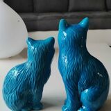 Pair of Chinese cats in turquoise blue enameled porcelain. Heights 20 & 17 cm
