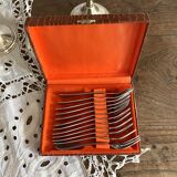 Silver dessert forks in a box