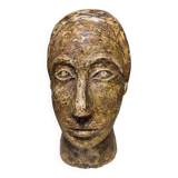 Brutalist head in varnished plaster
