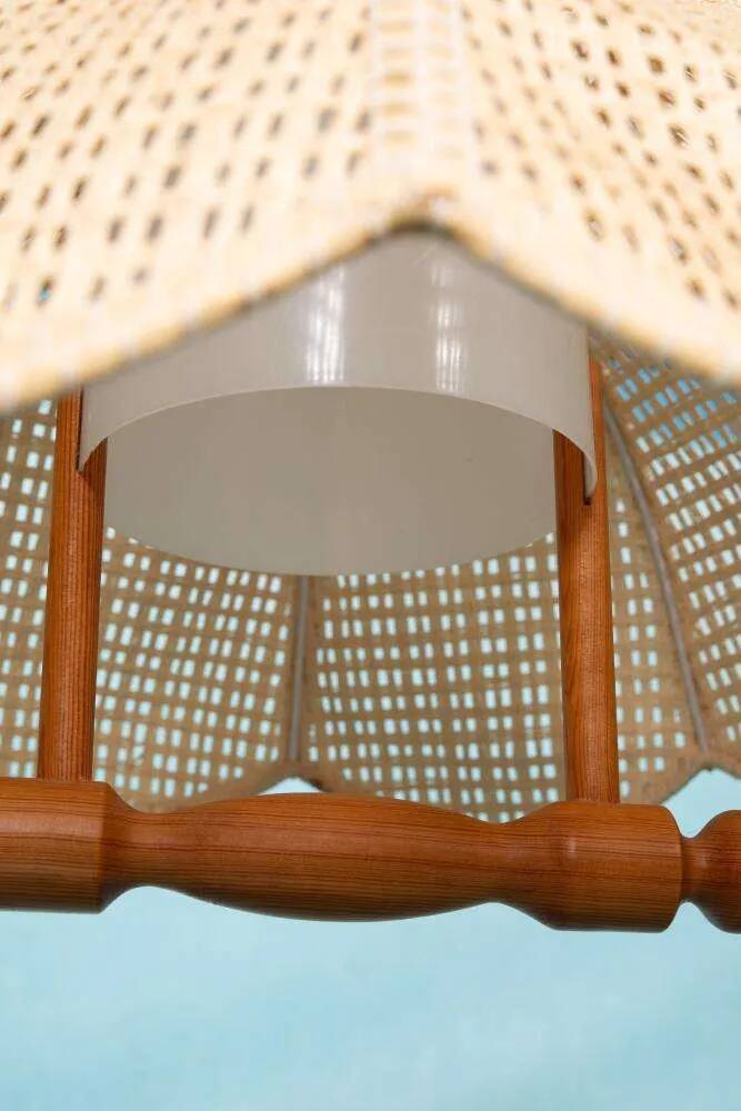 Swedish suspended lamp in bohemian strap.