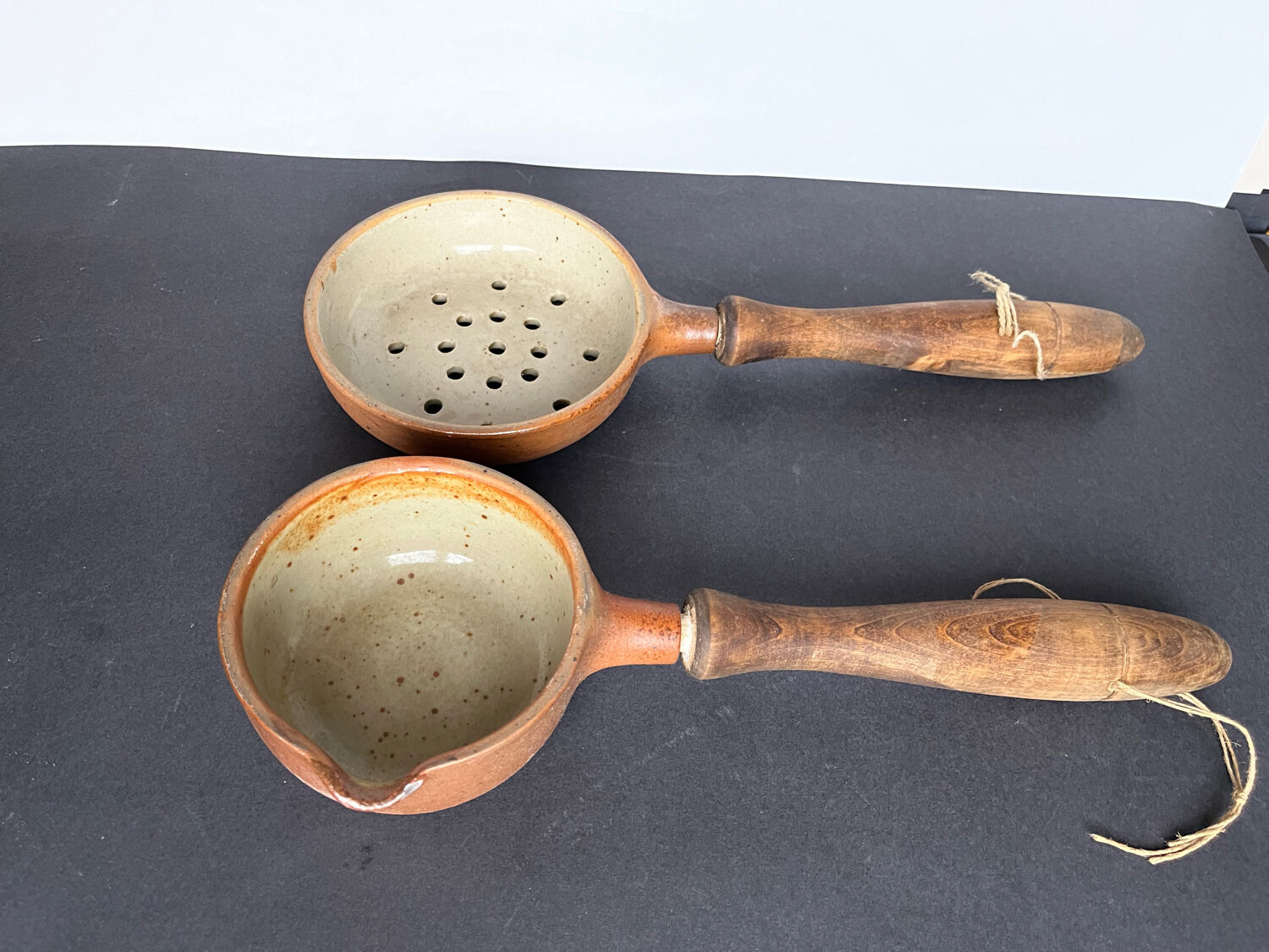 Ladle and sandstone strainer