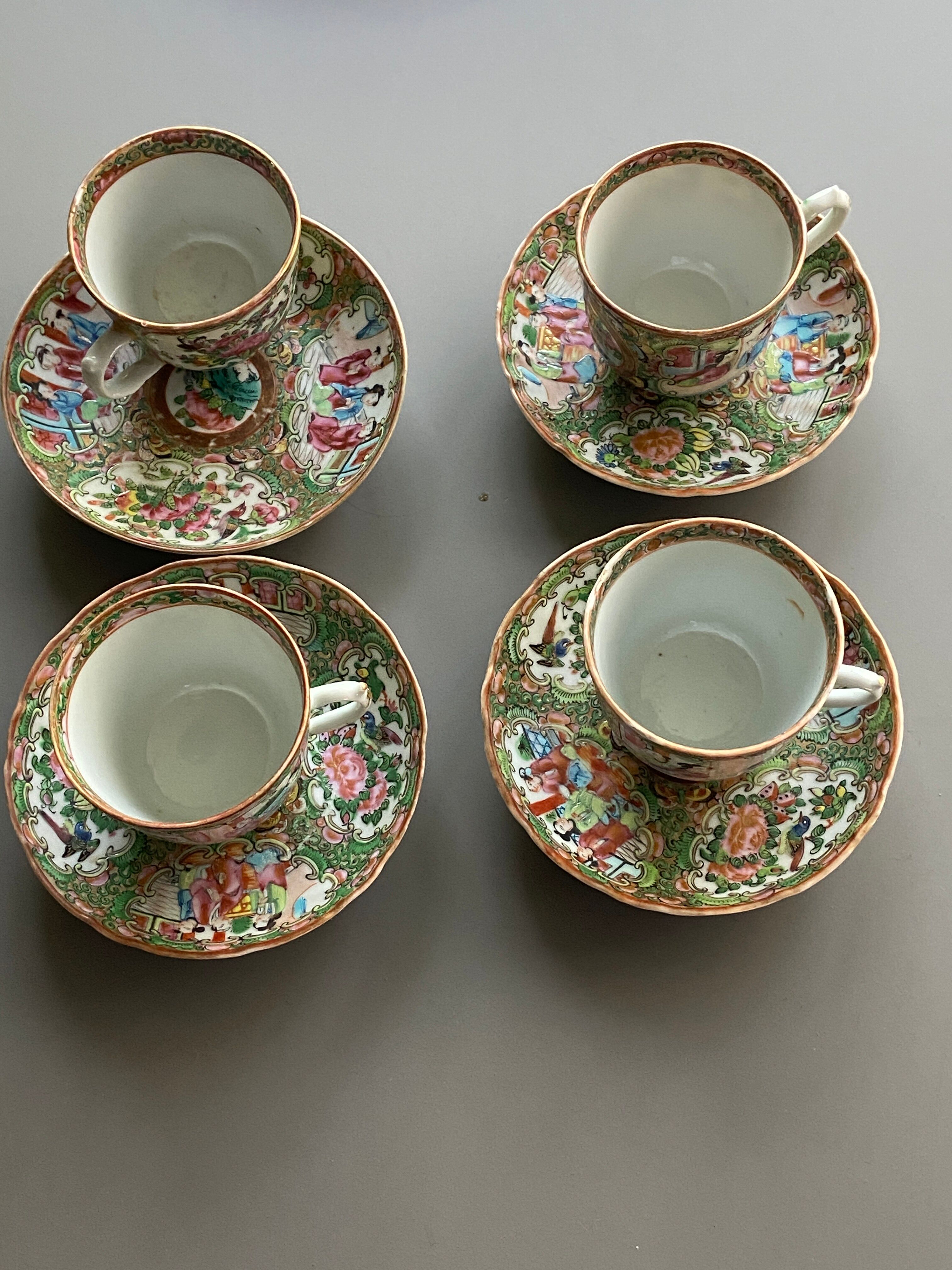 Four coffee cups and matching saucers in porcelain.