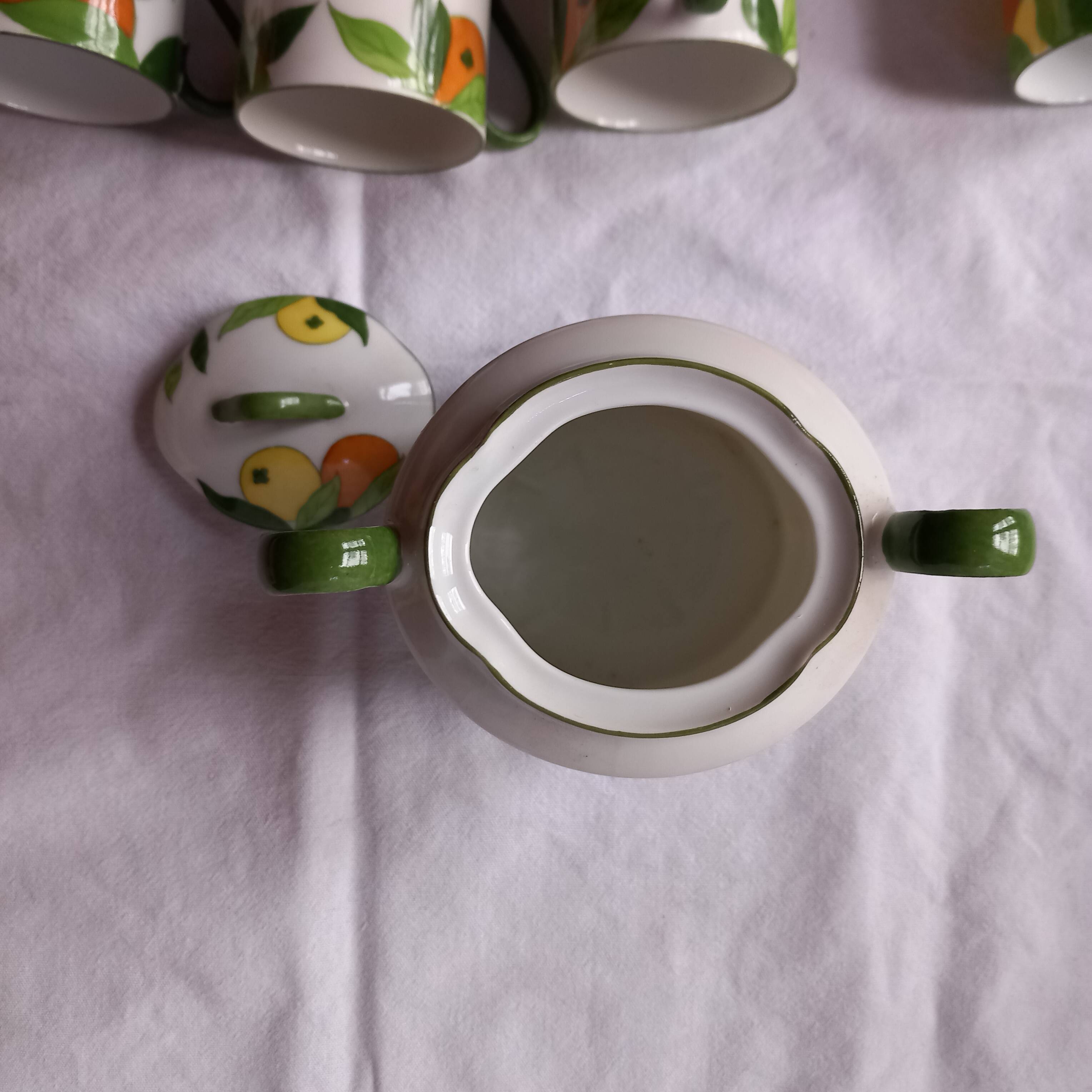 5 cups and a citrus sugar bowl, Lanternier Limoges porcelain