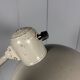 Grey two-arm Kaiser Idell clamp lamp model