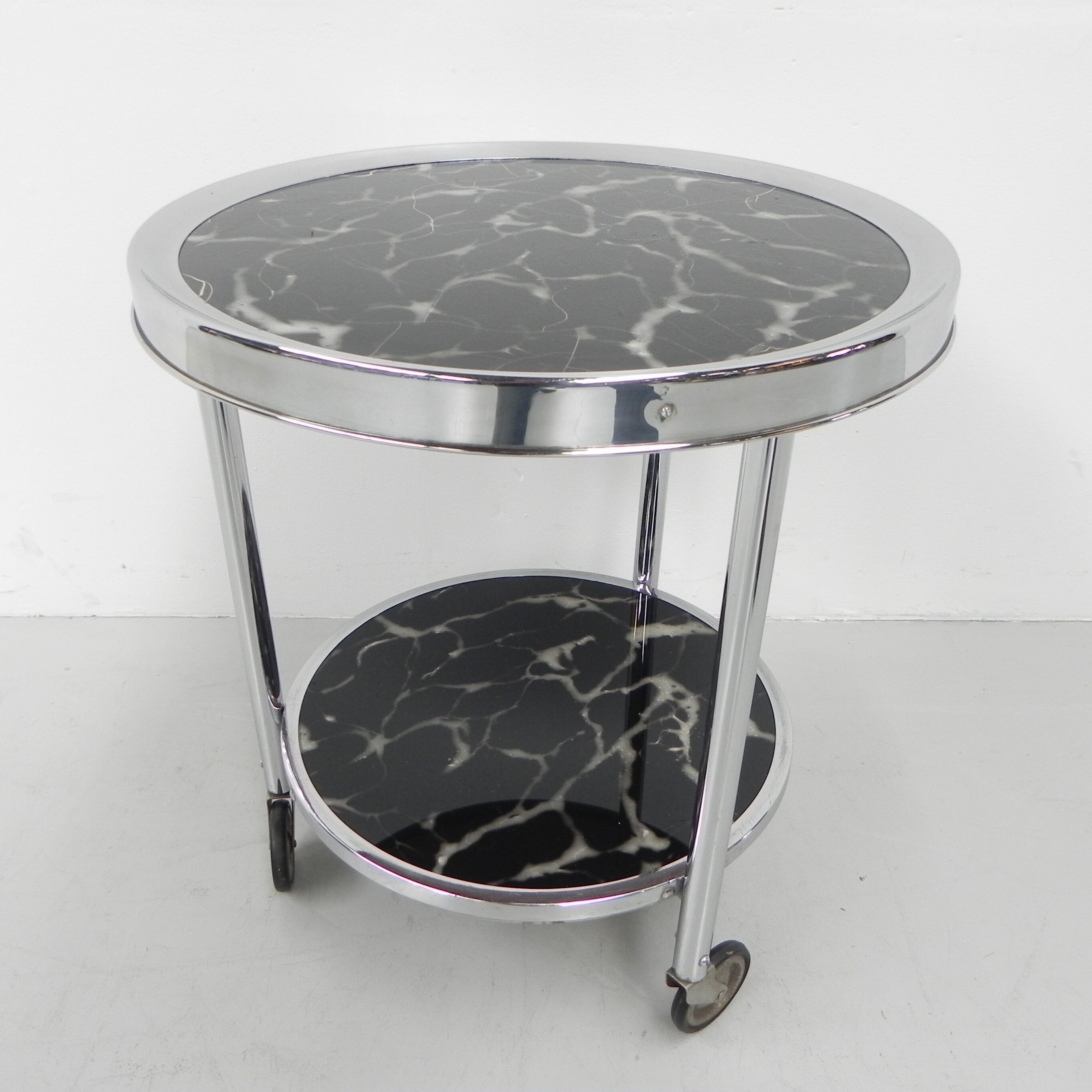 Art deco coffee table in bauhaus style with 2 glass tops and castors