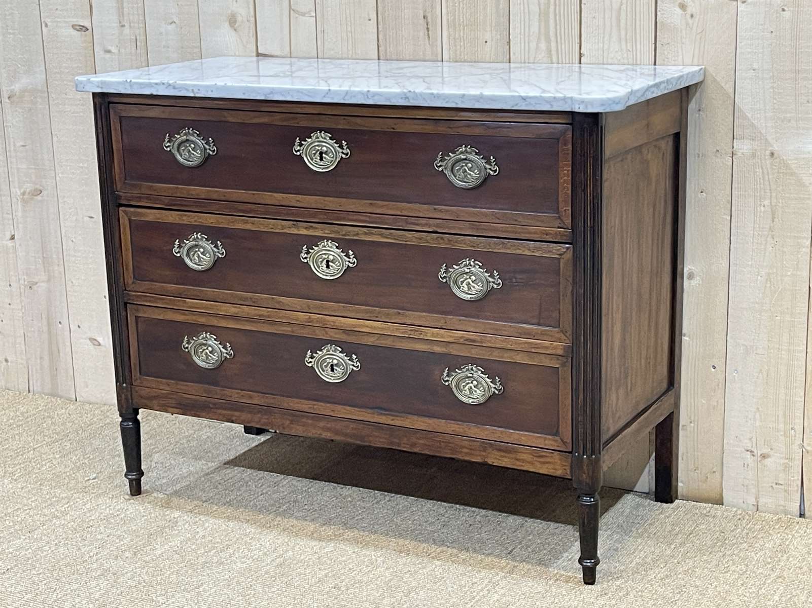 Louis XVI XIXth chest of drawers in mahogany and walnut and white marble top