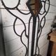 Art Deco coat rack wardrobe in wrought iron from the 1930s.