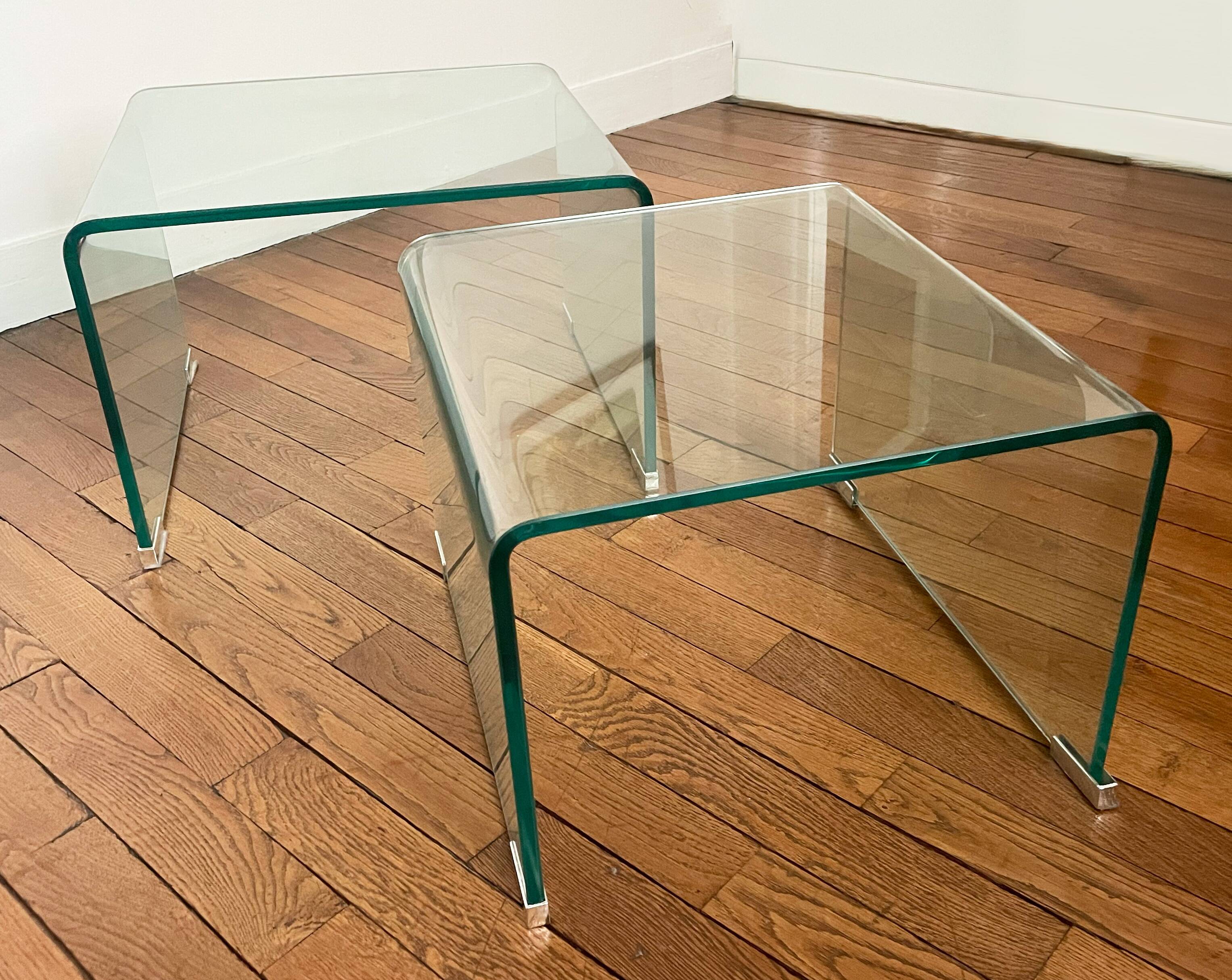 2 nesting tables in glass