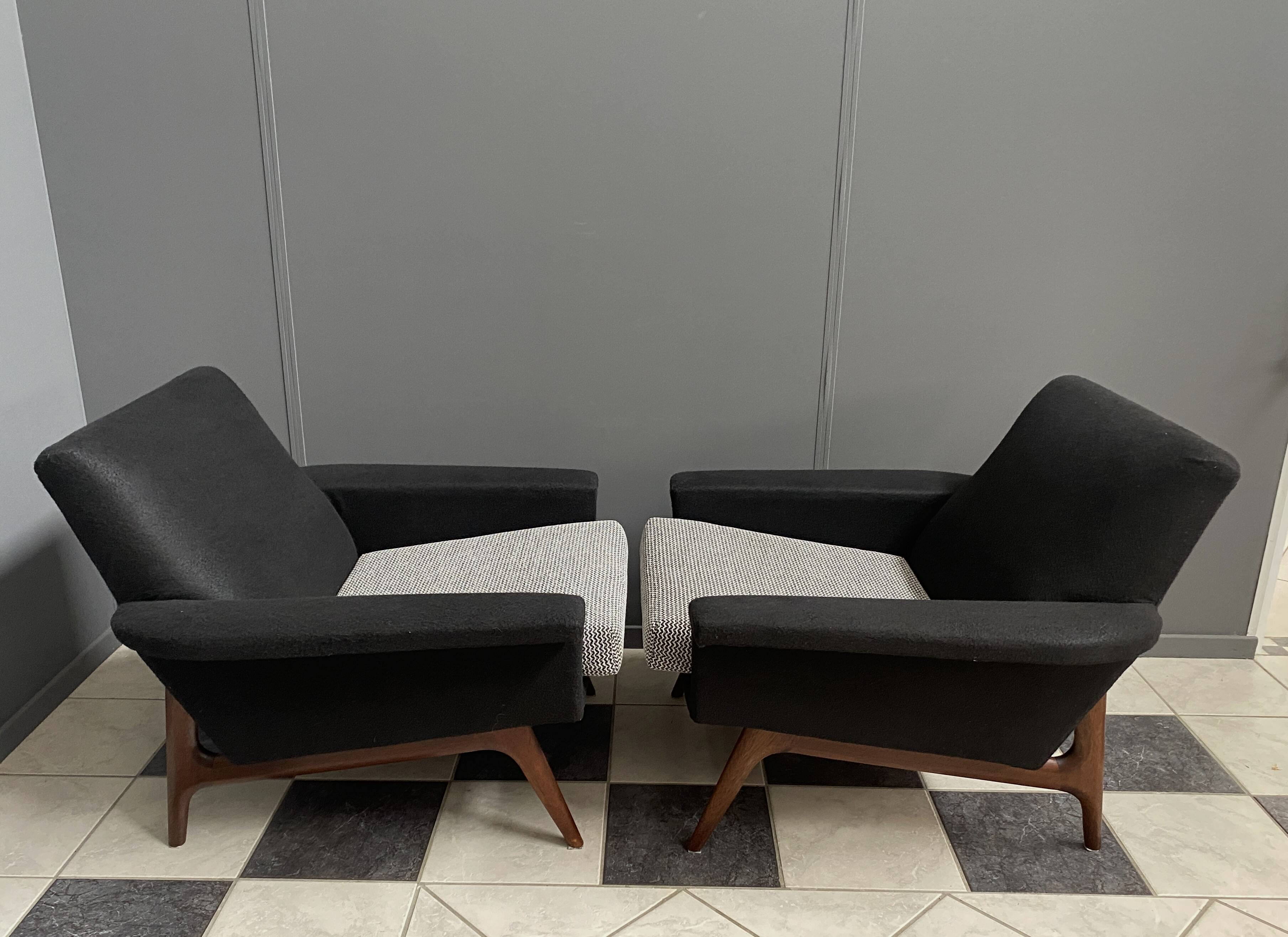 set of two black and white arm chairs 1960s