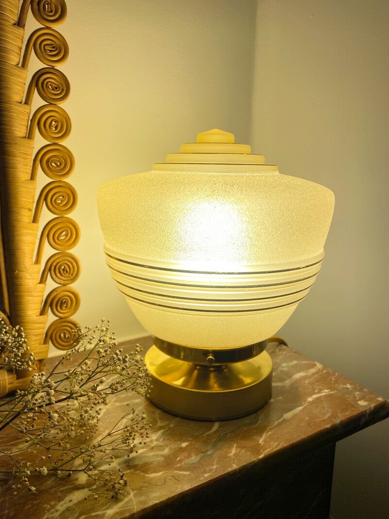 Old globe table lamp in beige and gold glass