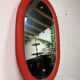 Miroir orange ovale vintage seventies 46 X 80 cm
