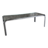 Coffee table with chrome legs and glass top, 1970