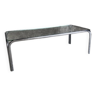 Coffee table with chrome legs and glass top, 1970