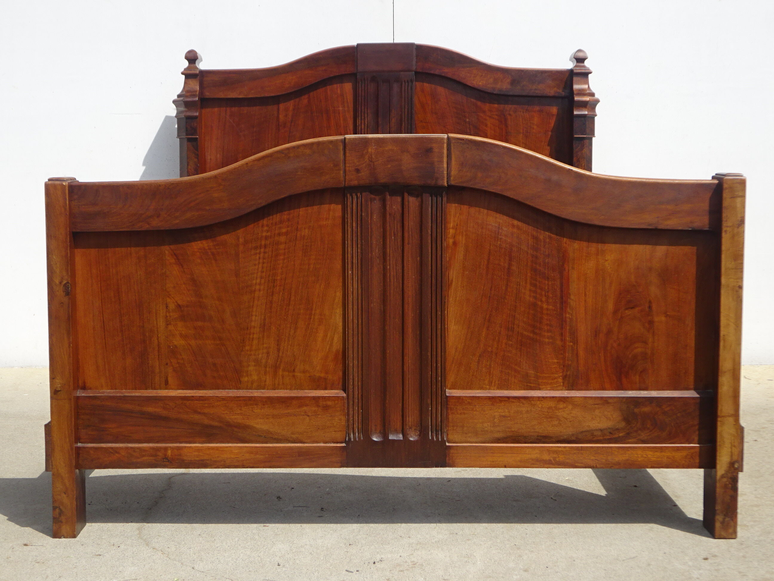 Walnut bed and walnut magnifying glass nineteenth century