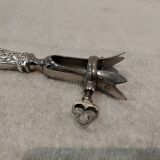 Silver-plated metal leg of lamb handle in art nouveau style