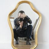 Golden mirror in wood and gold leaf