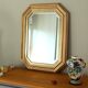 Miroir en bois doré octogonal