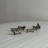 6 metal knife holders in the shape of small dogs