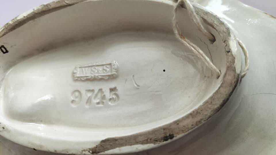 Polychrome slip wall plaque signed WS&S Rouen