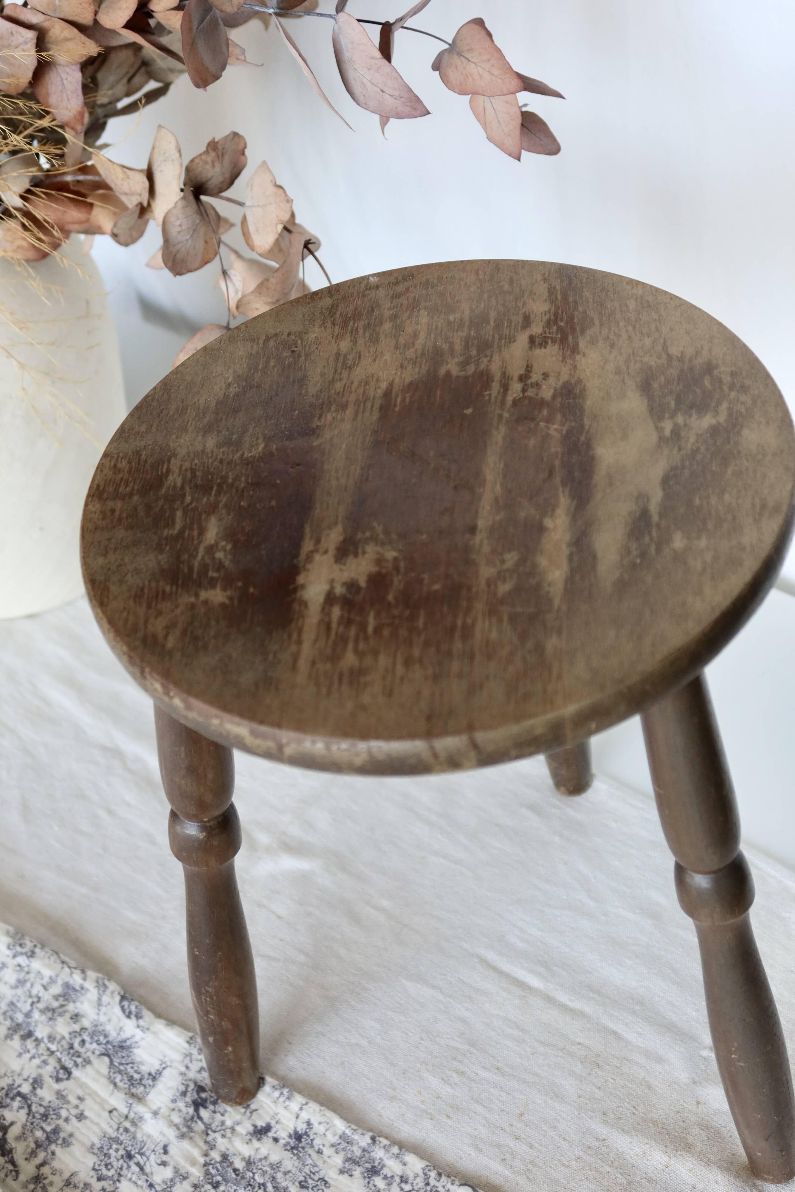 Antique tripod stool in turned wood