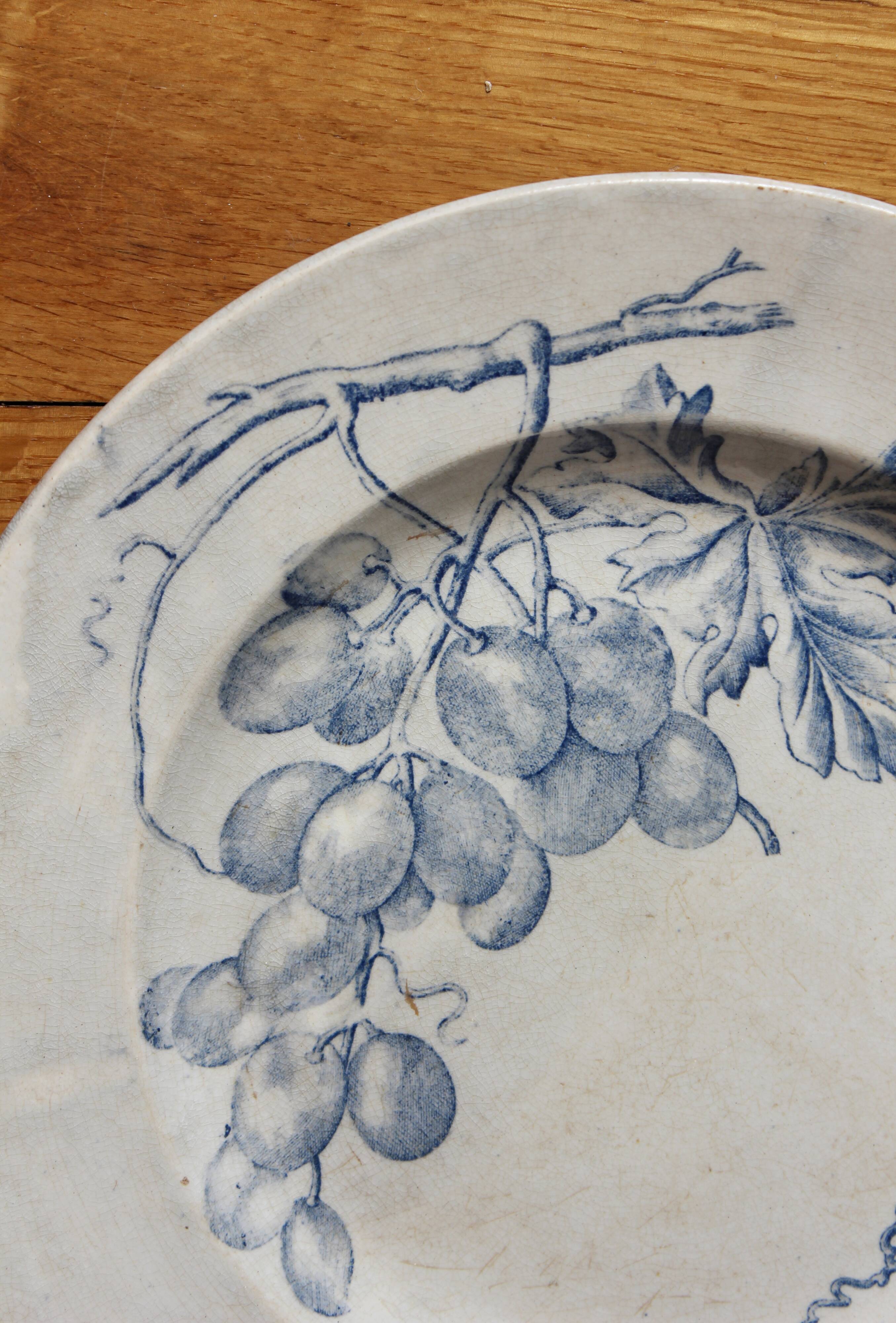 Round ironstone dish decorated with vines and grapes, late 19th-early 20th century