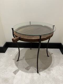 decorative wrought iron round table, glass and wood top.