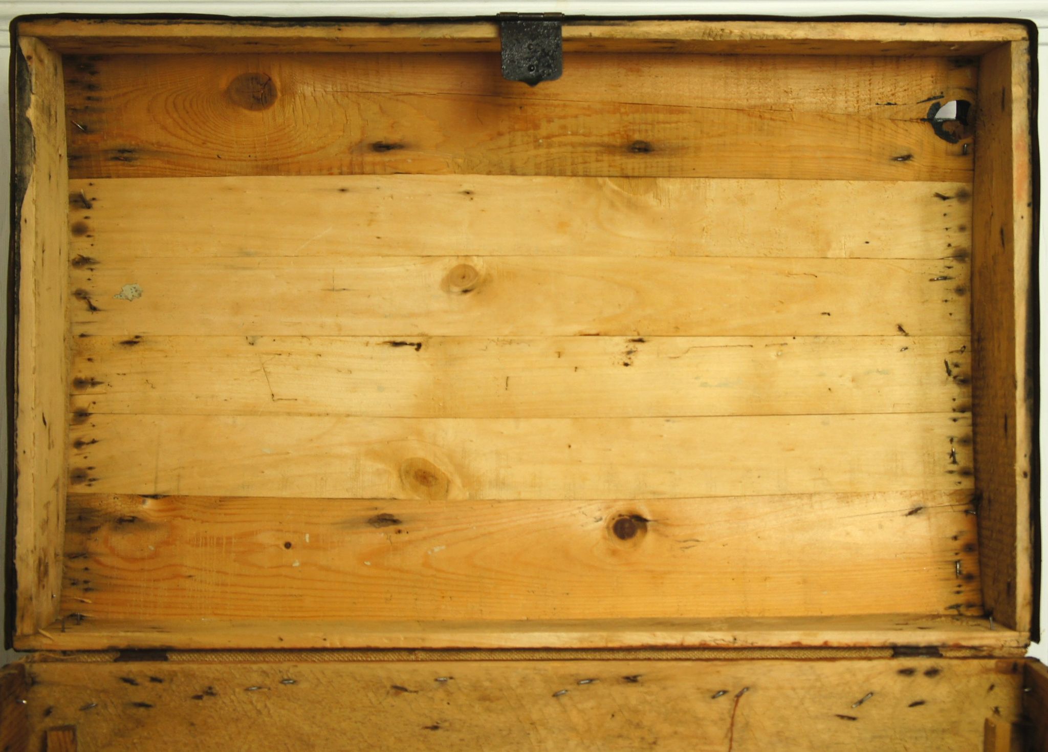 Old-curved wooden trunk - burlap