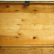 Old-curved wooden trunk - burlap