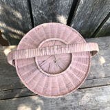 Old vintage pink rattan worker basket