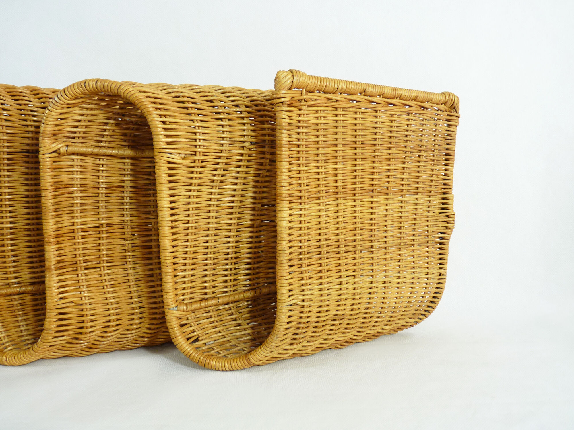 Magazine holder  in rattan wicker, wave shape 70s