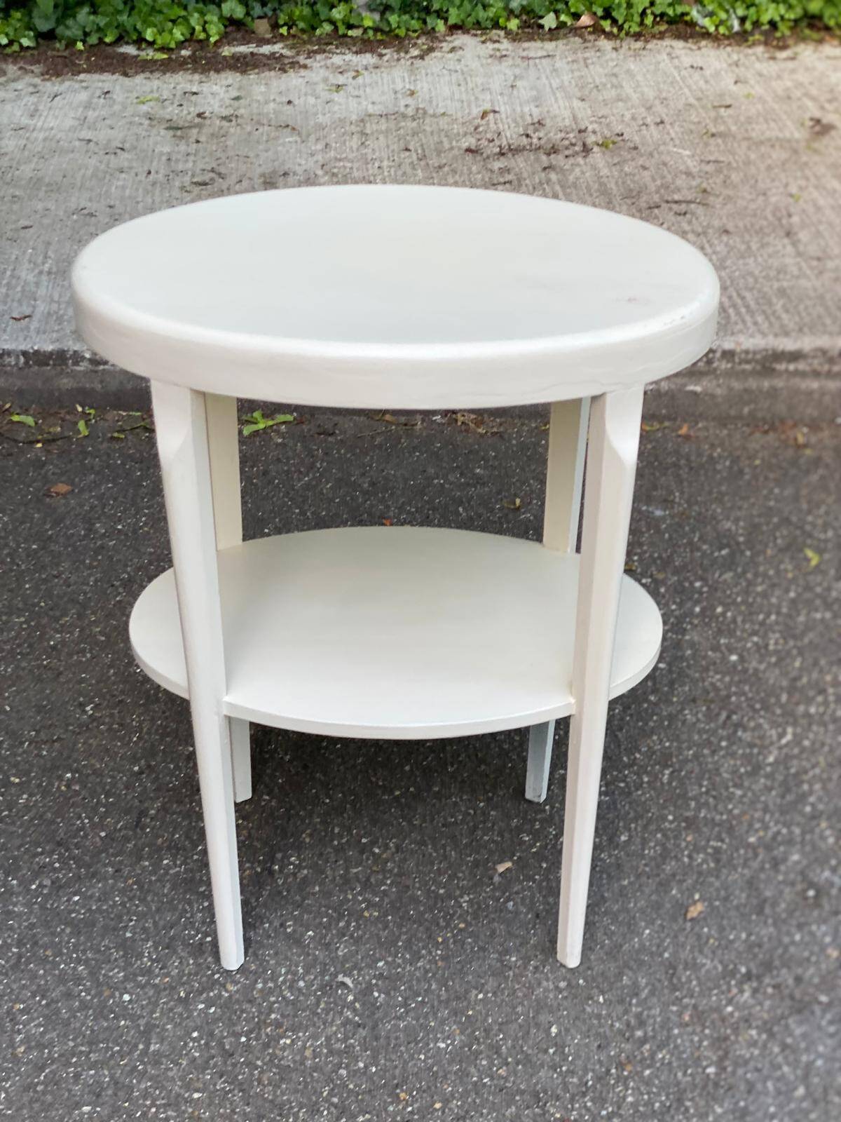 Vintage solid wood stool painted in beige.