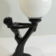 Art Deco lamp woman holding a luminous globe – Vintage resin lamp – L