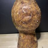 Brutalist head in varnished plaster