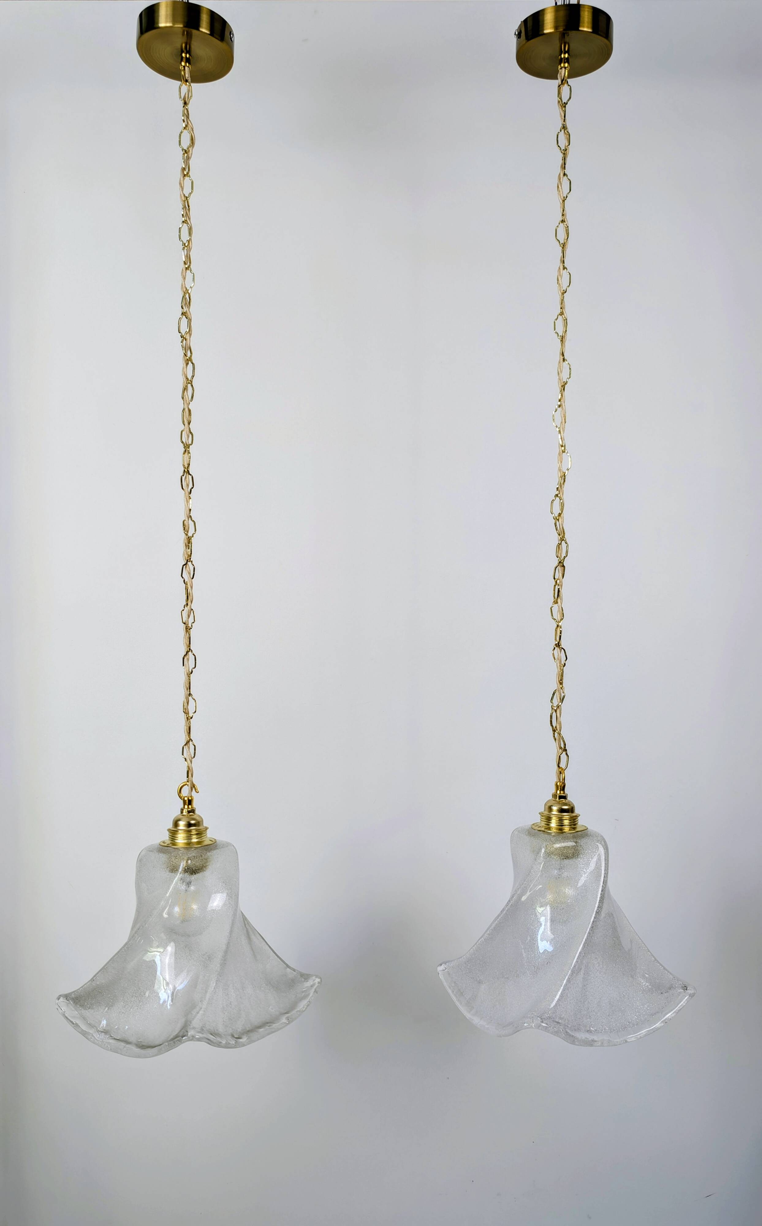 Pair of granite glass and brass pendant lights – poetic elegance