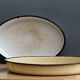 Pair of enamelled sheet metal dishes
