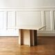 Square travertine coffee table
