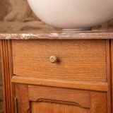Washbasin made from a bedside table.