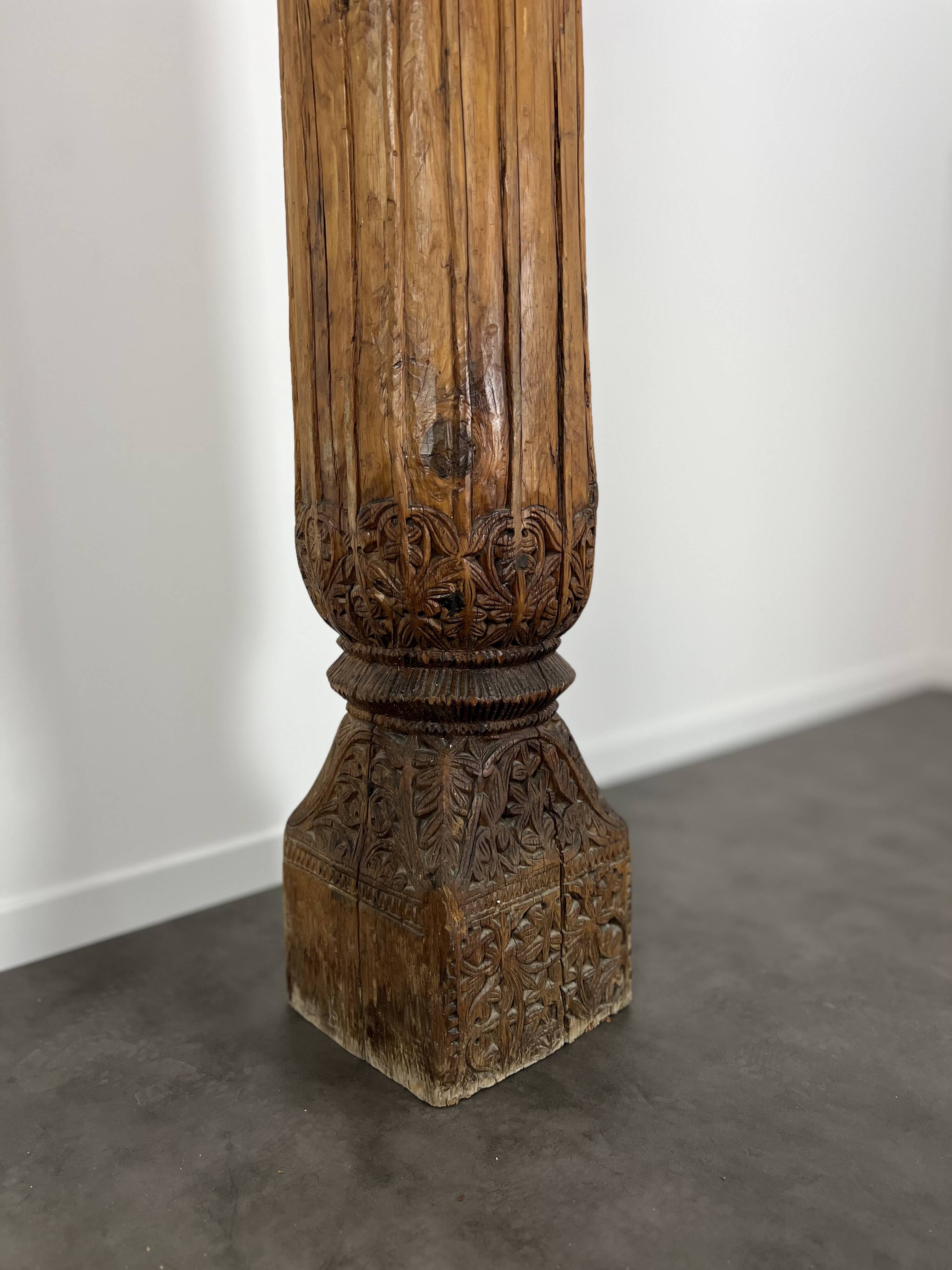Ancient large carved cedar pillar column from Pakistan, India.