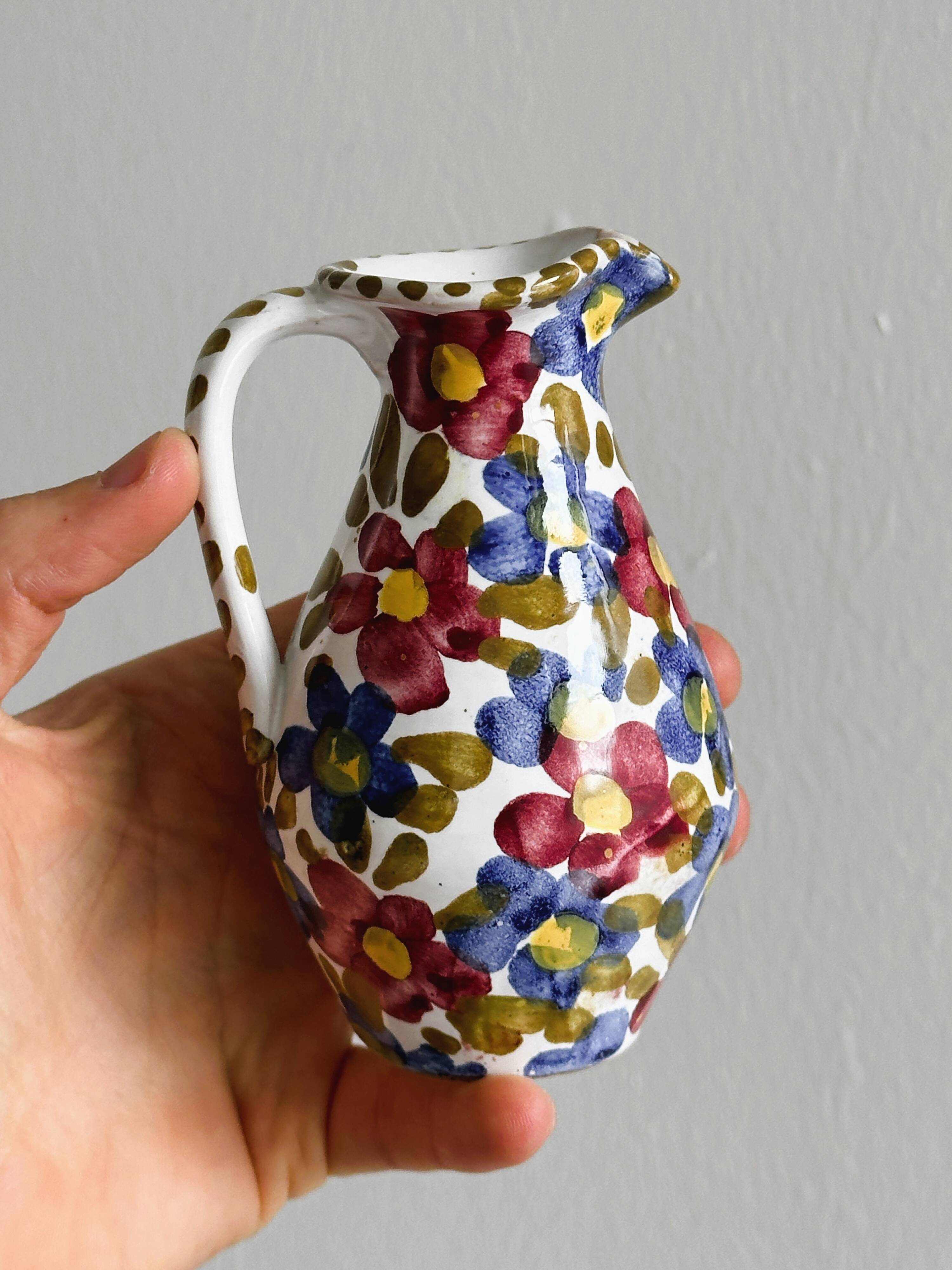 Hand painted ceramic milk jug, oiler