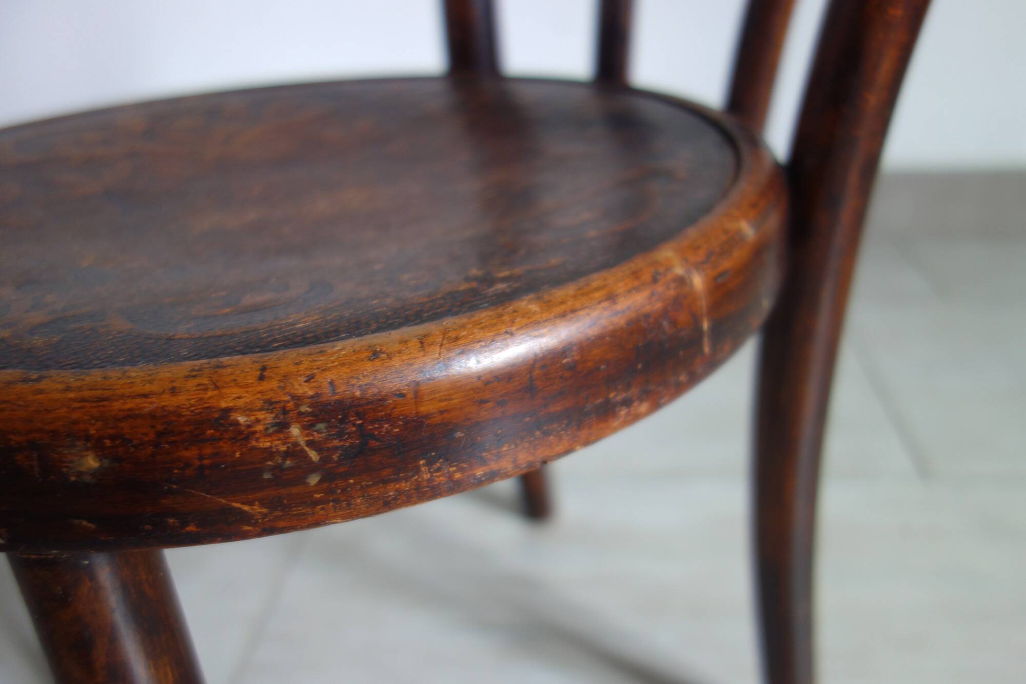 Antique curved wooden children's chair by Fischel, early 20th century.