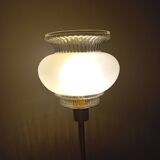 Table lamp with gold metal base and vintage white glass lampshade