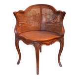 Louis XV style caned armchair