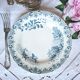 Mismatched antique flat plates made of ironstone accompanied by