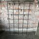 Silver & black metal wall rack, 1970