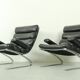 Set of 2 Sinus armchairs in black leather, COR Germany, 1970s