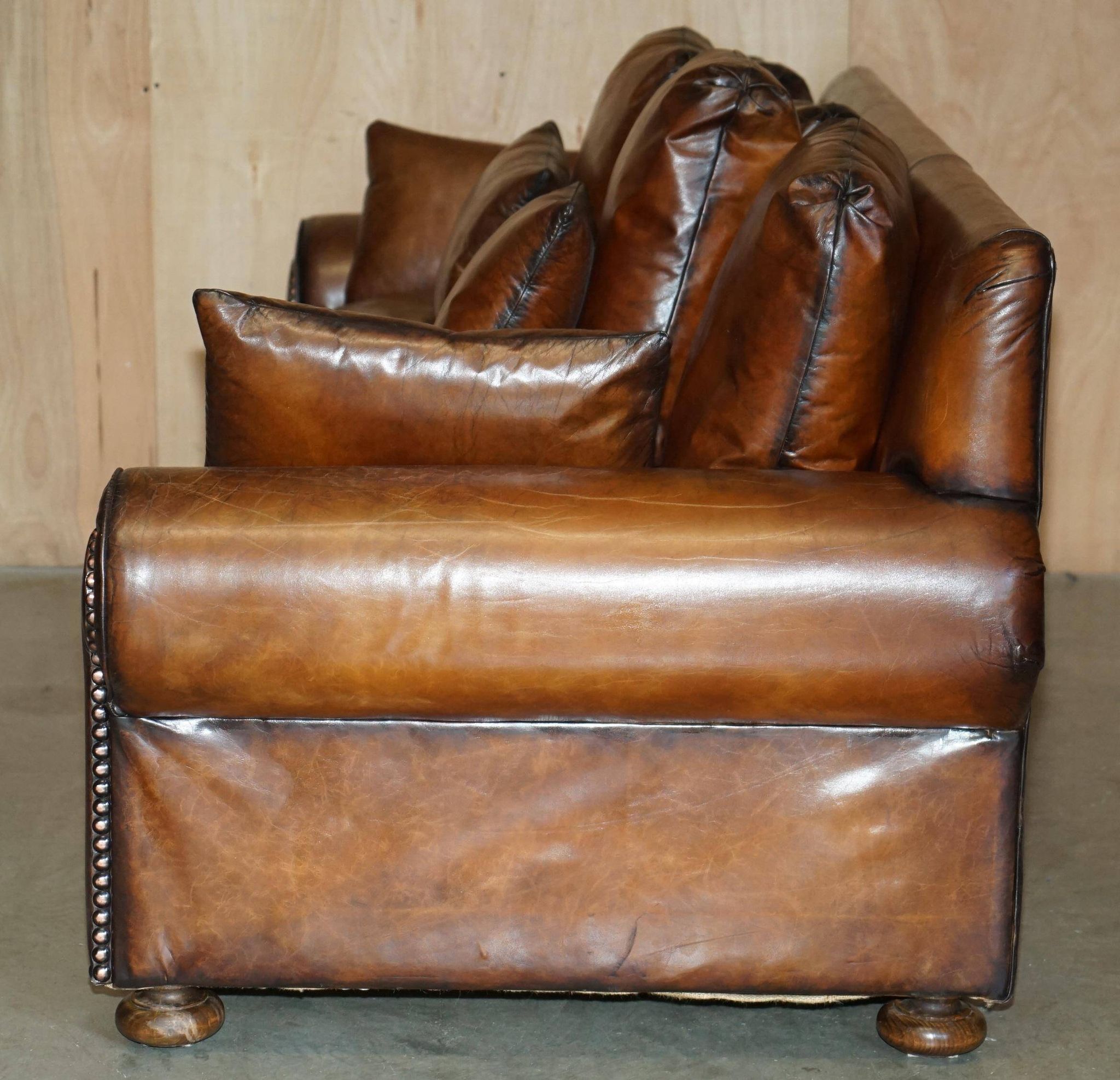 Pair of Ralph Lauren Jamaica club sofas restored in leather.