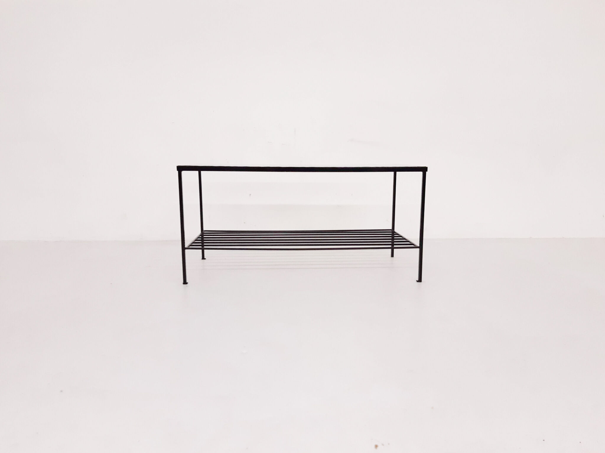 Mid-century modern minimalistic metal and glass coffee table