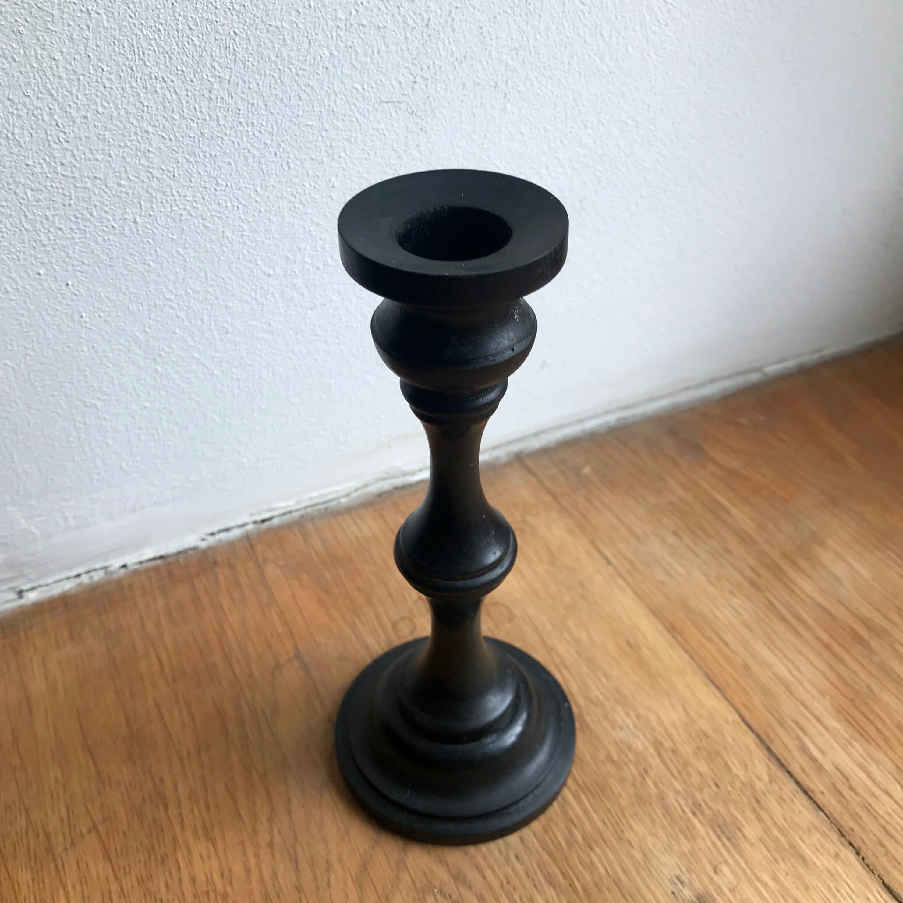 Black wooden candlestick