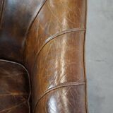 Stylish armchair made of cowhide leather with a unique design and beautiful finish